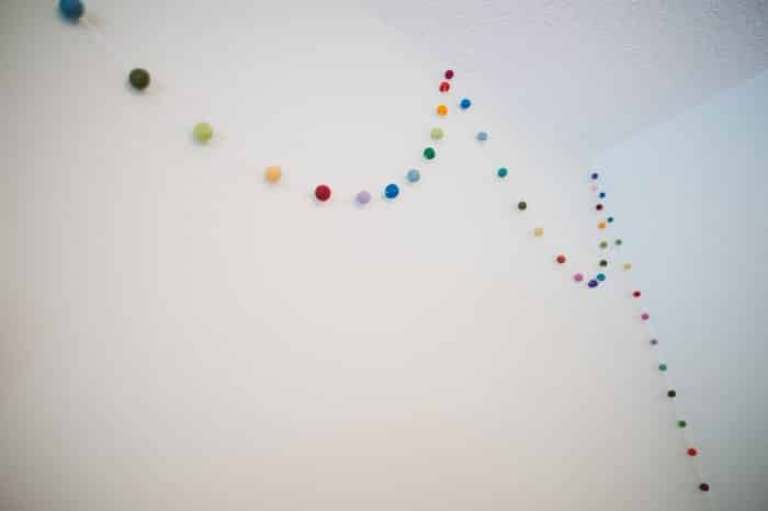 How to Make a Felt Ball Garland by Laura Radniecki