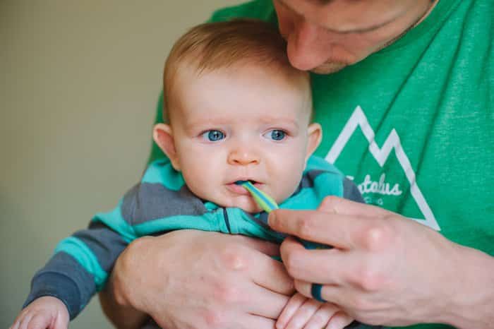 Brushing a Baby's Teeth - Tooth Brushing Tips for Babies - How to Brush a Baby's Teeth - Nuby Oral Care System Set and All Natural Baby Teeth and Gum Cleaner | Brush baby teeth, brush baby teeth tips, brush baby teeth when to start, when to start brushing baby teeth, brush baby gums.