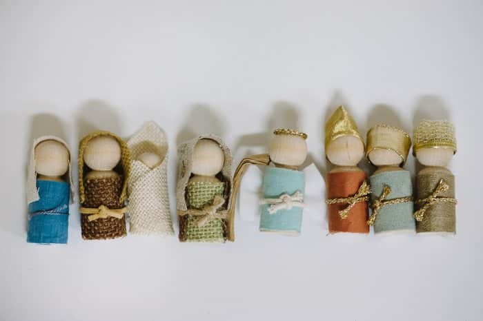 Rustic DIY Nativity Scene made with wooden peg people for kids.