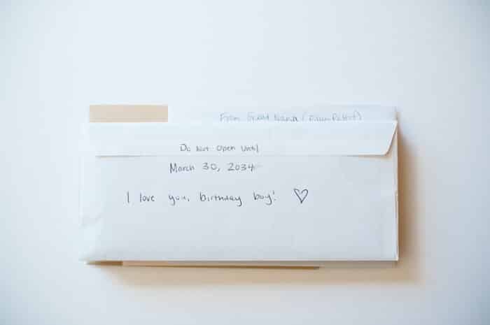 Letters written to a baby on their first birthday as part of a time capsule, sealed and to be read when they turn 18.