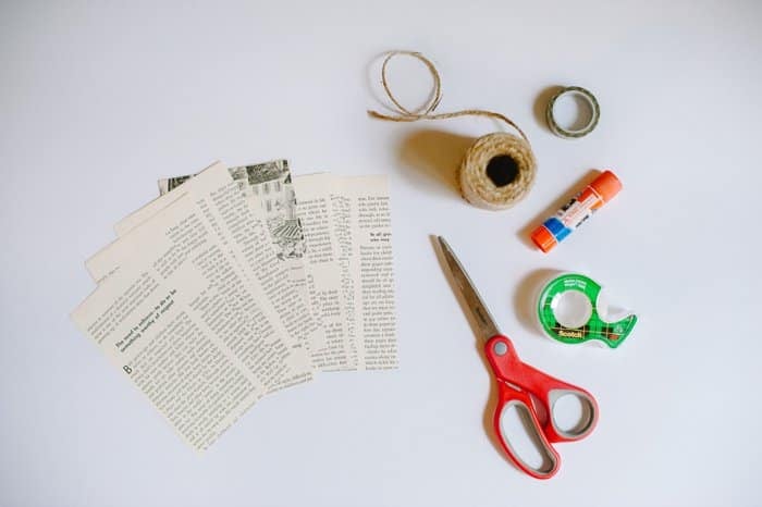 Supplies needed to make a book page bunting.