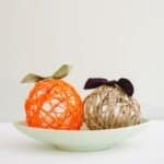 How to make yarn ball pumpkins for fall in this easy DIY craft tutorial.