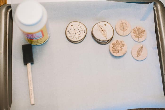 Use Mod Podge to seal wooden circles