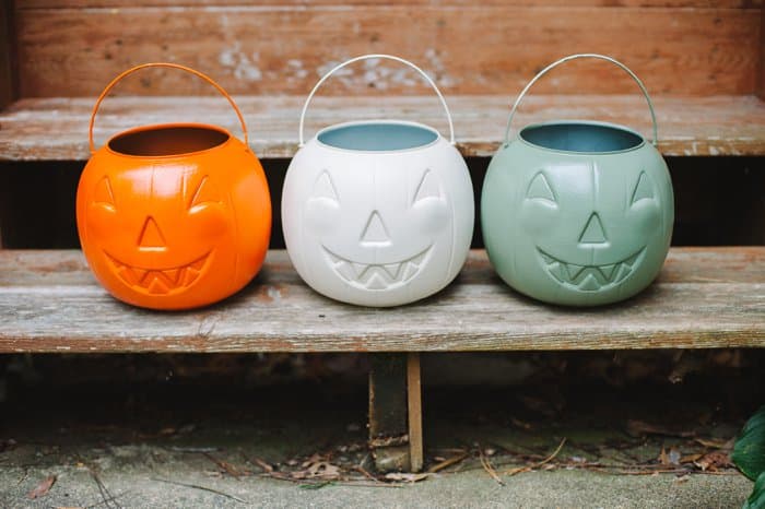 Spray paint plastic pumpkins for fall decorations