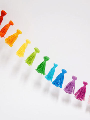 How to Make a DIY Rainbow Tassel Garland Made With Embroidery Floss