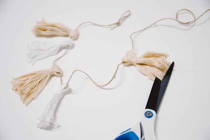 Cut the bottom of the embroidery floss for your diy christmas garland