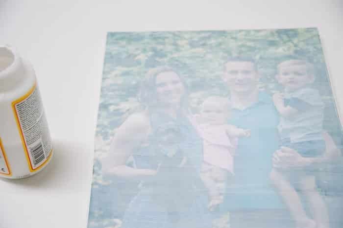 A handmade canvas print with photo on top and a layer of Mod Podge brushed horizontally onto the front.