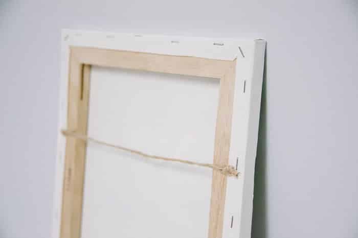 how to make your own canvas photos and hang with twine glued to the back