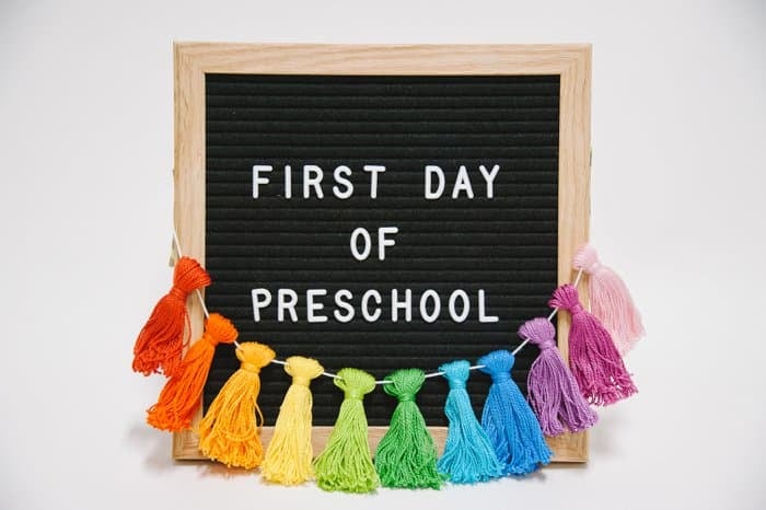 back to school sign idea for the first day with rainbow colors