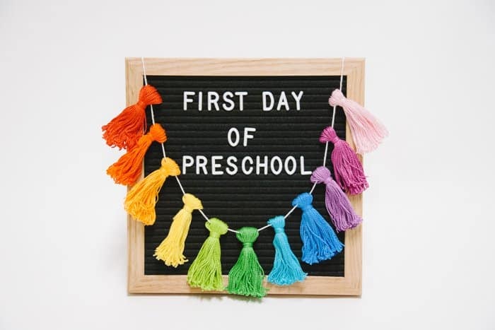 first day of school sign with tassel garland