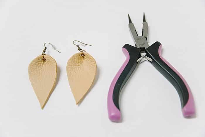 Leaf earrings made with leather.