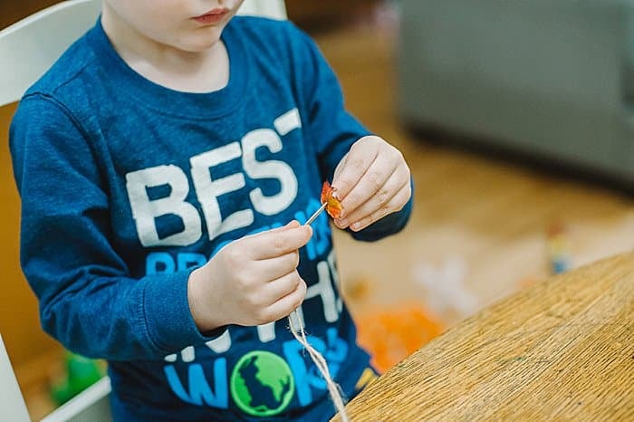 add leaves to create the leaf garland diy fall