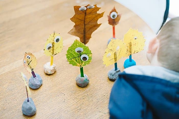 use play doh to prop up leaf monster crafts