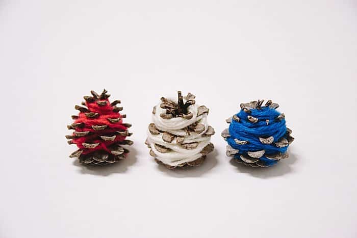 How to make DIY 4th of July Yarn-wrapped pine cones