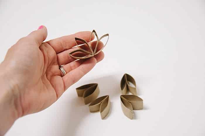 Paper flower petals made out of toilet paper tubes.