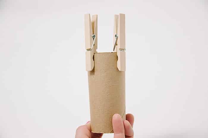 Clip clothes pins onto toilet paper rolls to make antlers for a deer