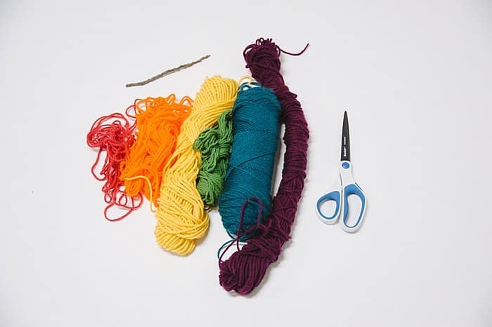 supplies needed to make a mini yarn wall hanging ornament