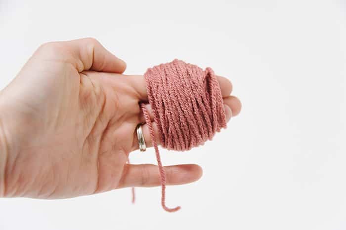 How to Make Yarn Pom Poms By Hand, Without a Pom Pom Maker