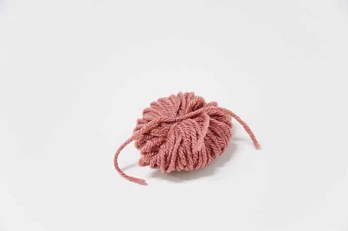 How to Make Yarn Pom Poms By Hand, Without a Pom Pom Maker