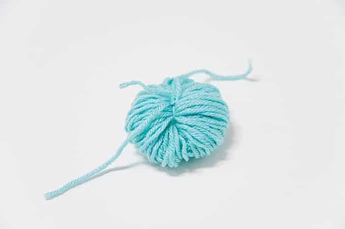 How to Make Yarn Pom Poms By Hand, Without a Pom Pom Maker