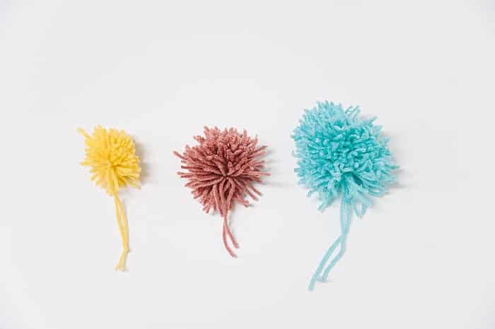 How to Make Yarn Pom Poms By Hand, Without a Pom Pom Maker