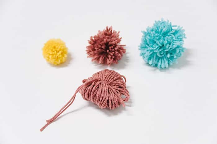 How to Make Yarn Pom Poms By Hand, Without a Pom Pom Maker