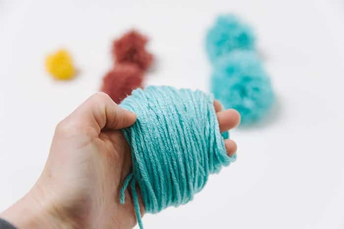 How to Make Yarn Pom Poms By Hand, Without a Pom Pom Maker