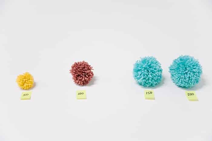 How to Make Yarn Pom Poms By Hand, Without a Pom Pom Maker