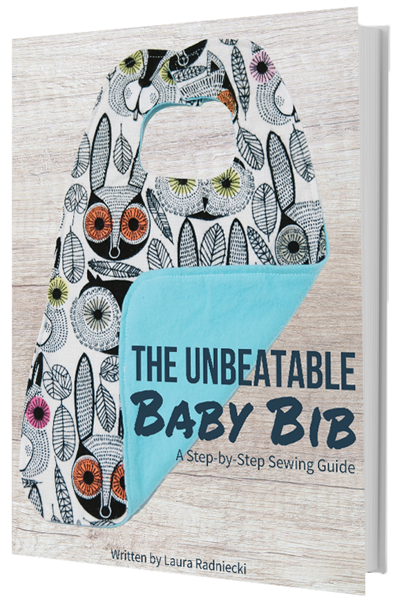A digital guide and printable sewing pattern teaching how to make a baby bib.