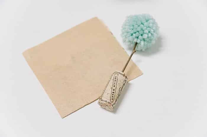 sand the bottom of the cork if it won't stand up on it's own