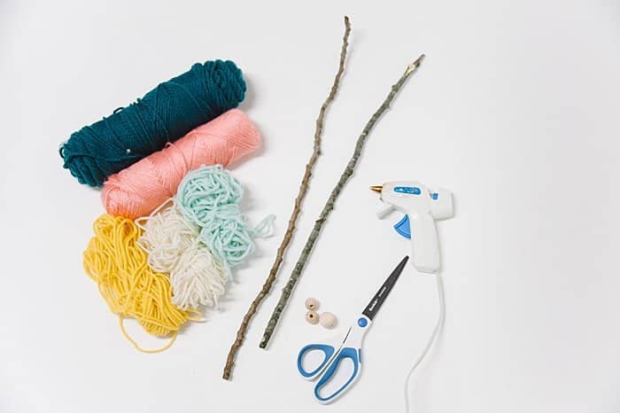 supplies needed to make yarn wrapped sticks for kids