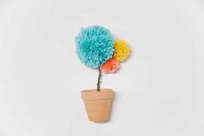 potted flower made with yarn pom poms