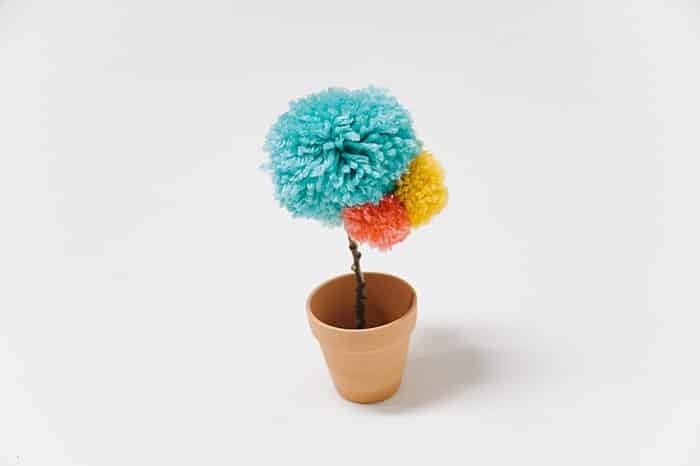 potted faux pom pom flower