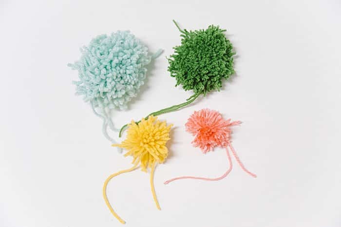 Yarn pom poms to make faux diy cactus plants