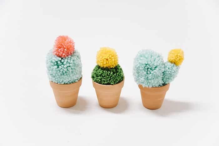 Three DIY faux yarn cacti.