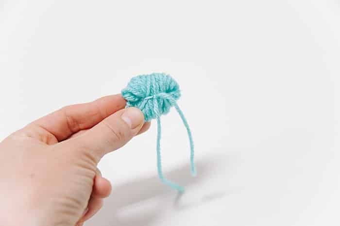 diy pom pom using fork