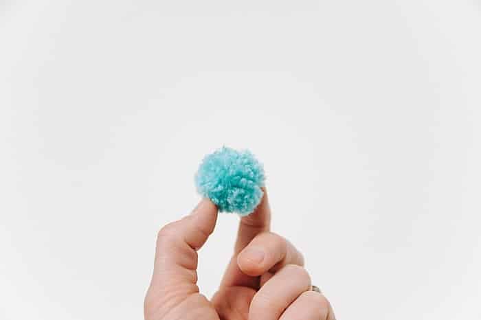 how to make diy pom poms with a fork