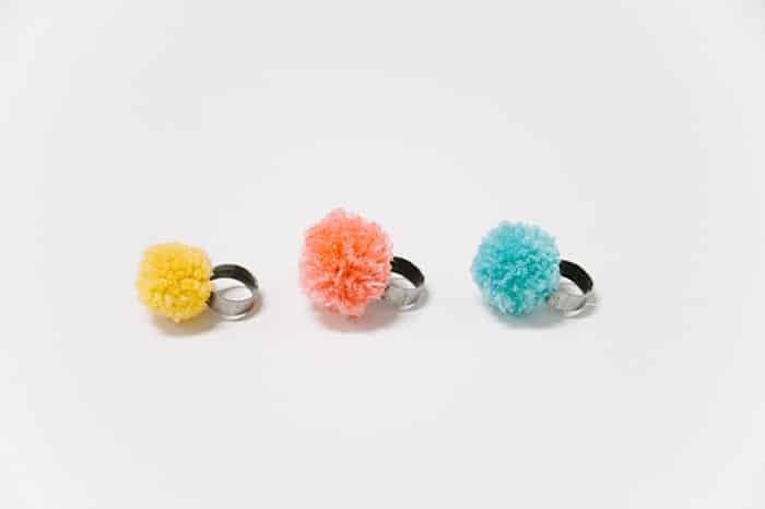 diy rings with pom poms on them