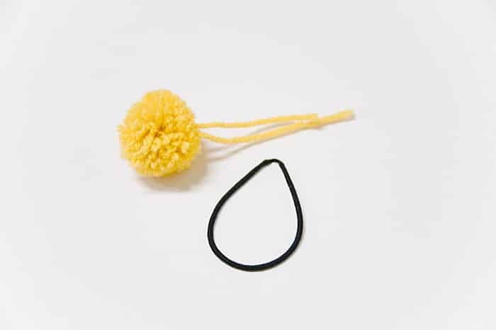 supplies to make a diy pom pom hair tie