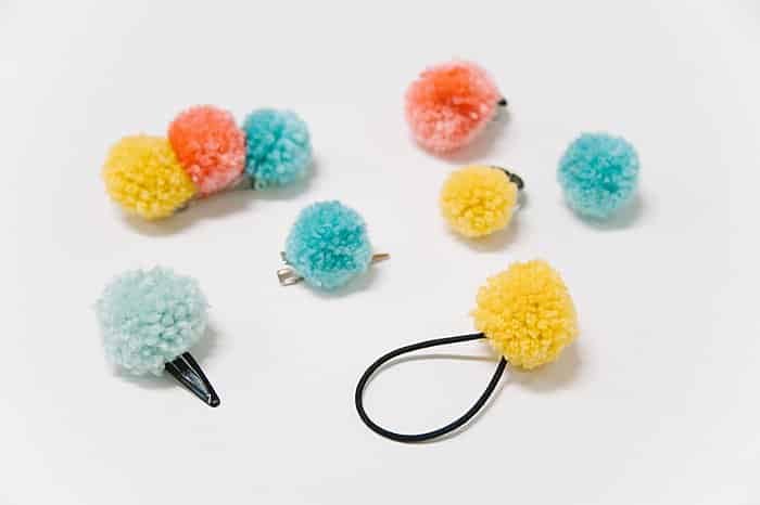 diy pom pom hair accessories, hair clips, barrettes, hair ties, and rings.