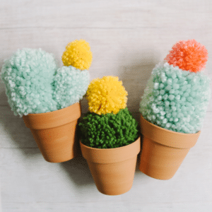 DIY Faux Cactus made with Yarn Pom Poms _ Faux Potted Cacti