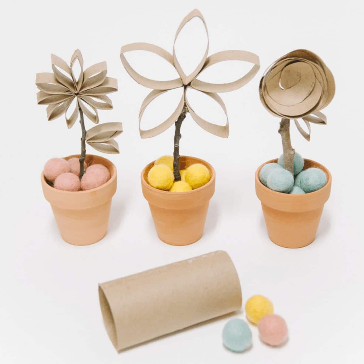 How to make faux potted flowers using toilet paper tubes.