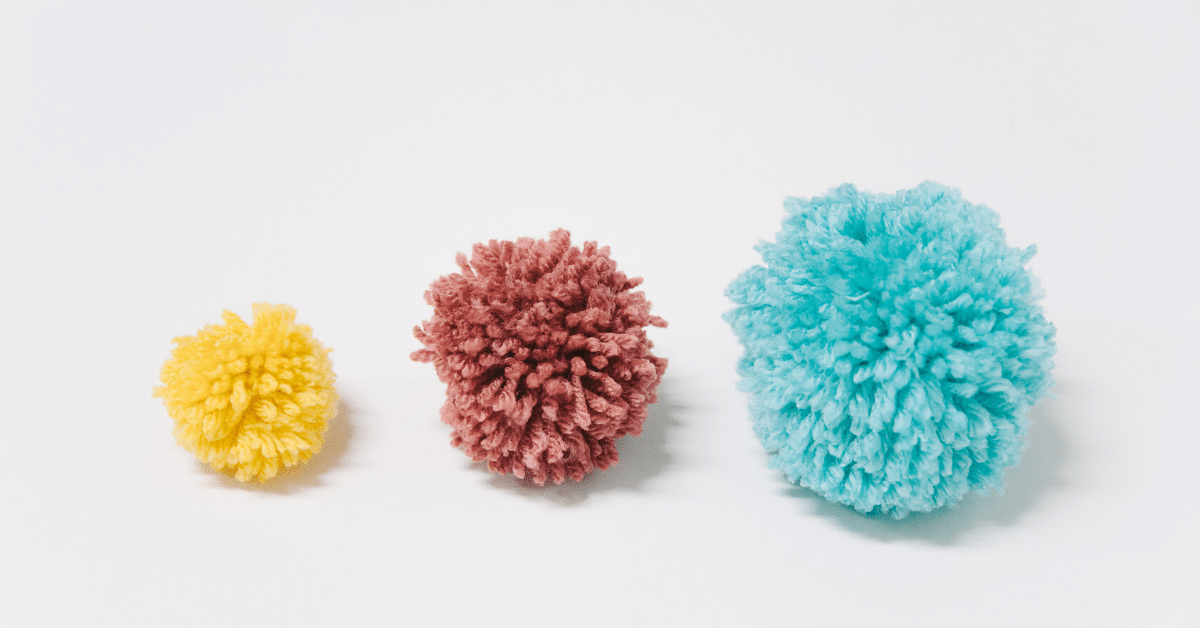 How to Make Yarn Pom Poms By Hand, Without a Pom Pom Maker