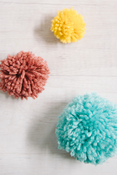 How to Make Yarn Pom Poms By Hand, Without a Pom Pom Maker