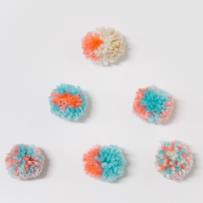 How to Make Multi-Colored Pom Poms | Easy Yarn Pom Pom Variations