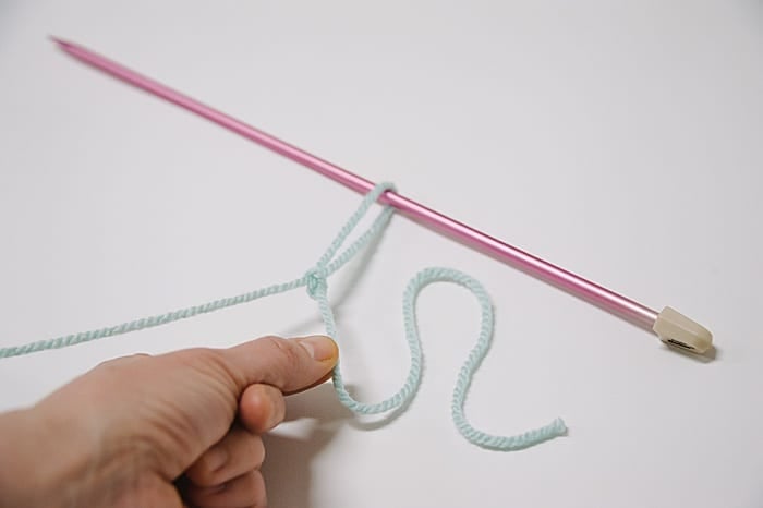 pull the short yarn tail to make the slip knot tighter