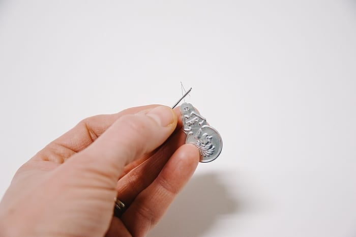 if you need to use a needle threader to help you get thread into the eye of your needle, first put the wire end of the needle threader through the eye of your needle