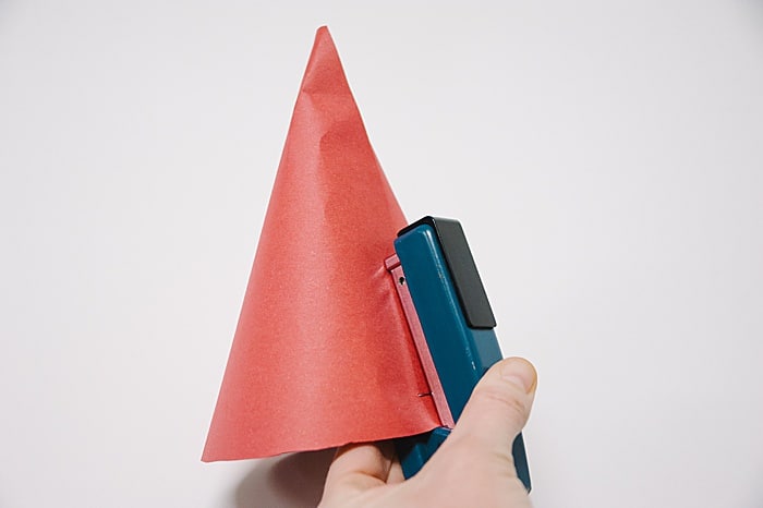 Staple up the paper cone as high as you can.