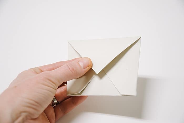 fold top flap down again, and you have made an envelope out of paper