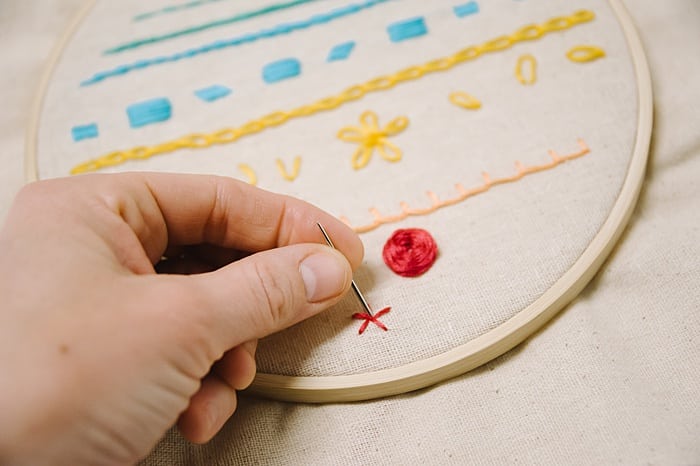 woven wheel stitch for embroidery looks like a rose